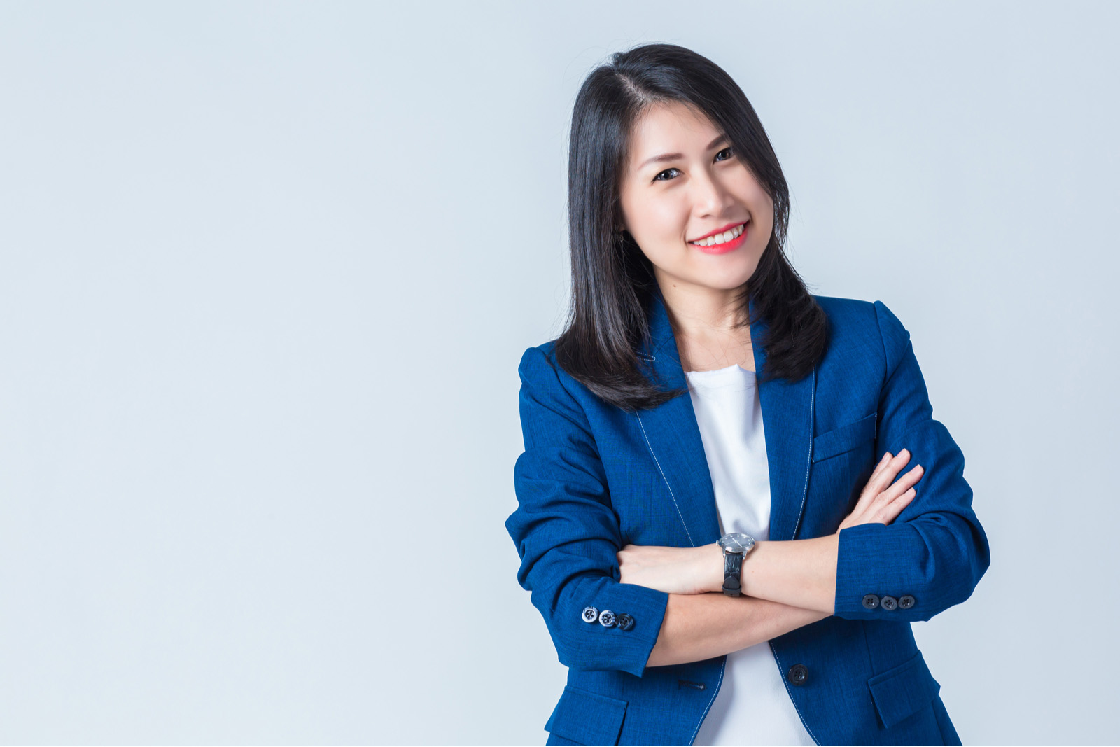 Business professional posing with arms crossed